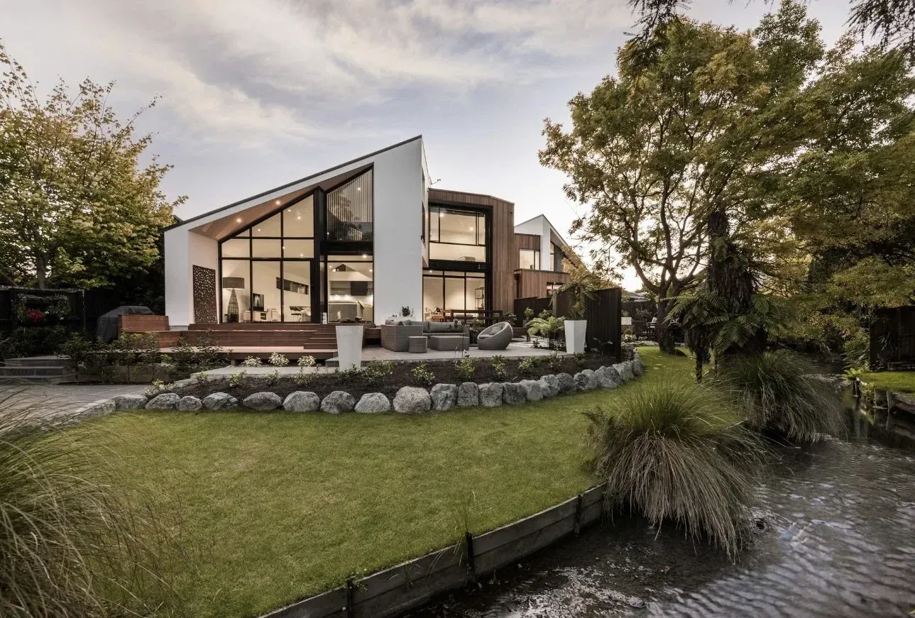 Modern Canterbury home with large windows and landscaped garden, residential electrical services by South Island Electrical