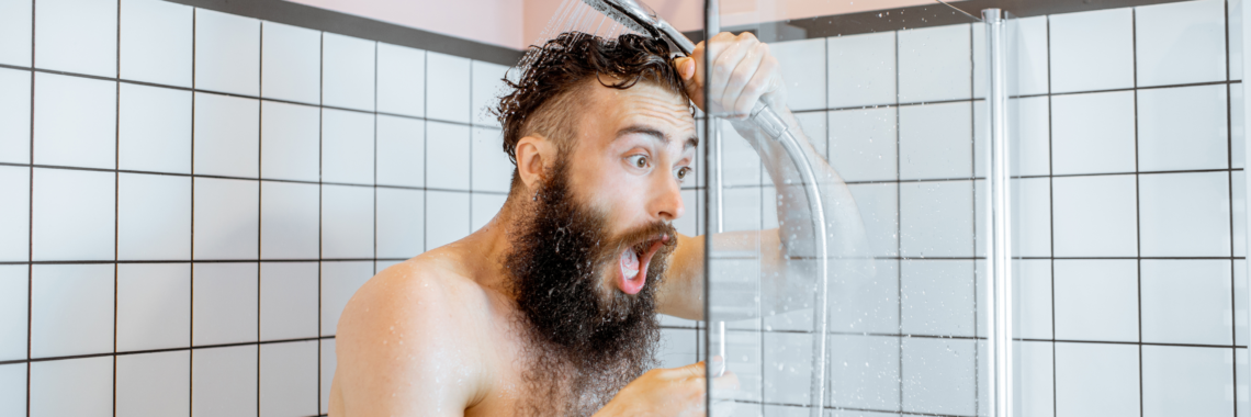Man in cold shower