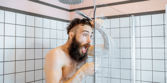 Man in cold shower